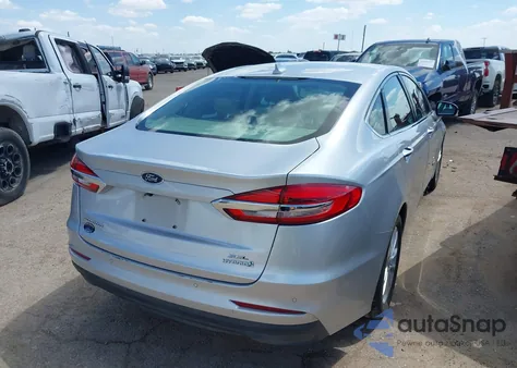 2019 Ford Fusion Hybrid Sel z USA, uszkodzony, nr VIN 3FA6P0MU3KR136800